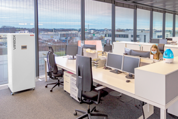 The ESTA Virbox in use in an open-plan office.