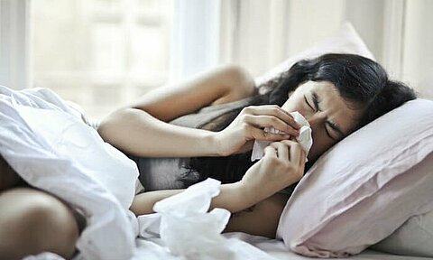 Woman sick with flu Woman sick with flu