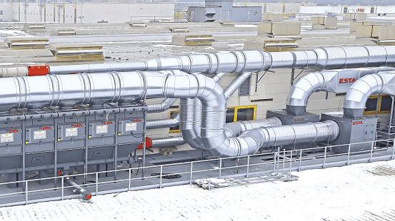 Die zentrale Außenabsauganlage des stationären DUSTMAC bei der Firma PERI. Die zentrale Außenabsauganlage des stationären DUSTMAC bei der Firma PERI.