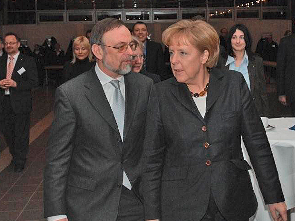 ESTA Managing Director Dr. Peter Kulitz with Federal Chancellor Dr. Angela Merkel. ESTA Managing Director Dr. Peter Kulitz with Federal Chancellor Dr. Angela Merkel.